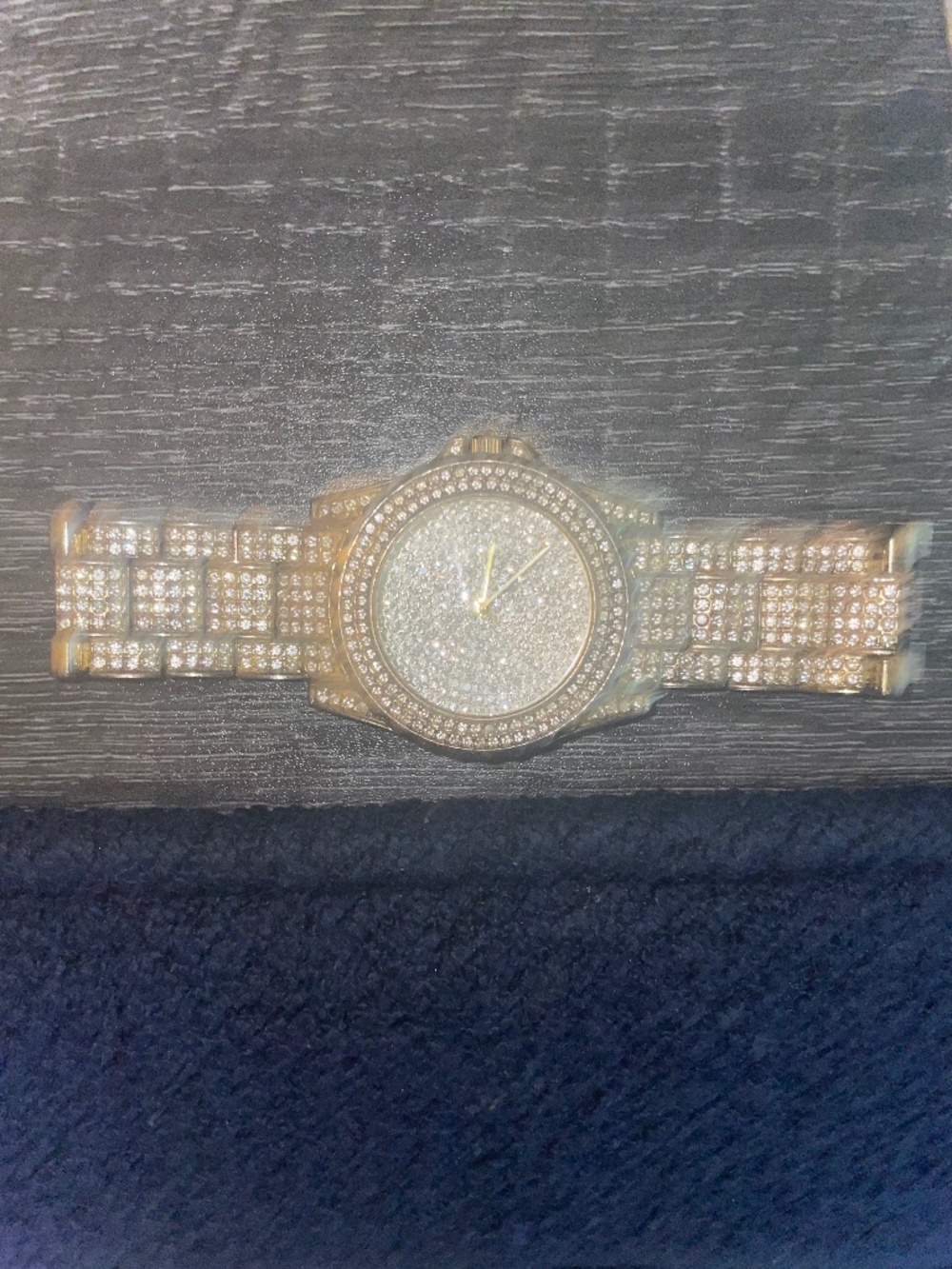 gold-tone "iced-out" quartz wristwatch covered rhinestones